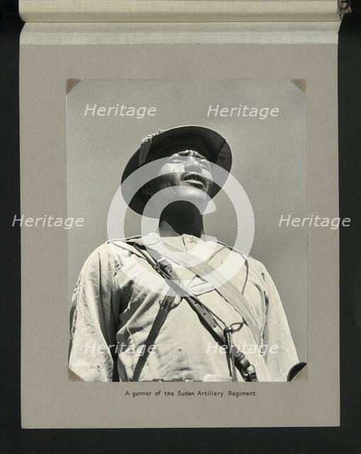 A gunner of the Sudan Artillery Regiment, 1964. Creators: Colonial Office, Unknown.