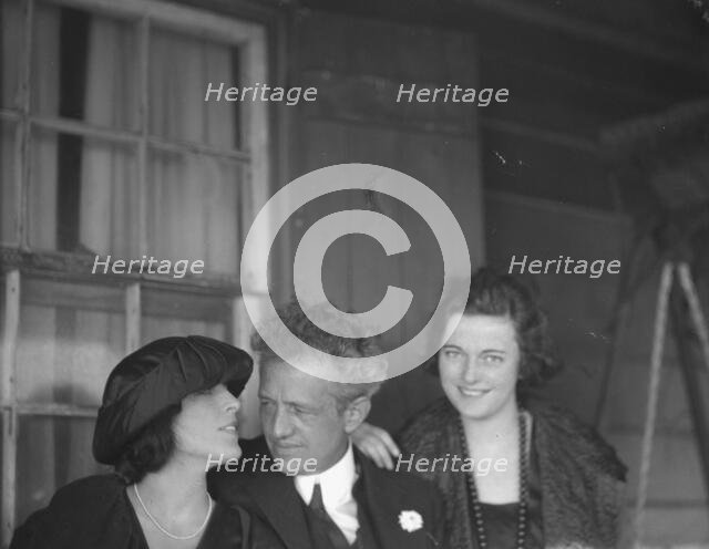 Arnold Genthe with two women friends on the porch of his bungalow in Long Beach, N.Y., c1911-c1942. Creator: Arnold Genthe.