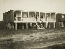 Railway carriage converted into a holiday home, possibly at Shoreham-by-Sea, West Sussex, 1920s. Artist: Unknown.