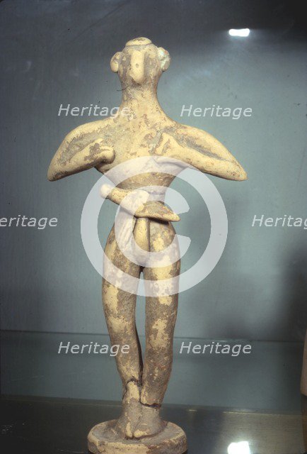 Clay Votive Figurine of Man wearing Belt and Dagger, Proto-Palatial Period, 2000BC-1700 BC.  Artist: Unknown.