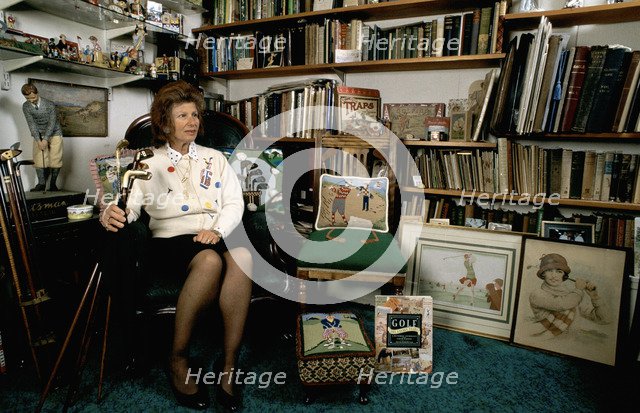Author Sarah Fabian Baddiel at home with some of her golfing collection. Artist: Unknown