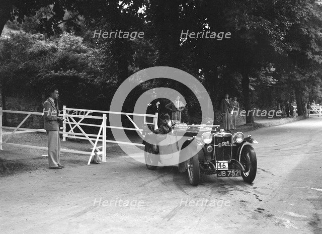 Cream Cracker Team MG PB of CAN May competing at the MCC Torquay Rally, July 1937. Artist: Bill Brunell.