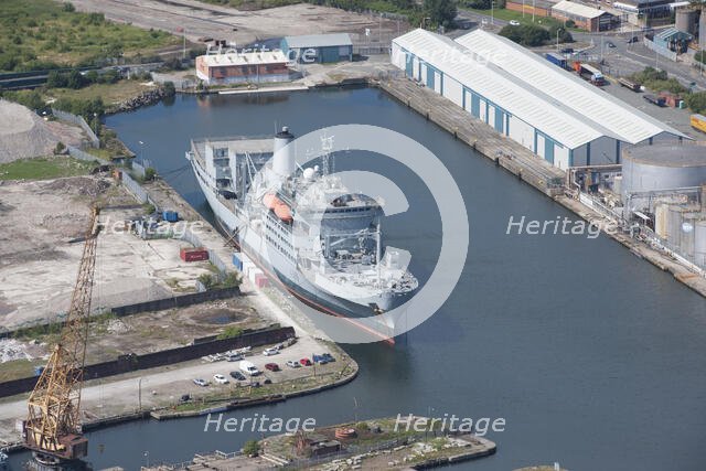 A ship moored up at Ilchester Wharf, West Float, Birkenhead, Wirral, 2015. Creator: Historic England.