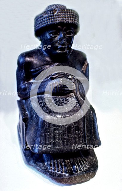 Seated statue of Gudea, prince of Lagash city', one of many Sculptures dedicated to this ruler wh…