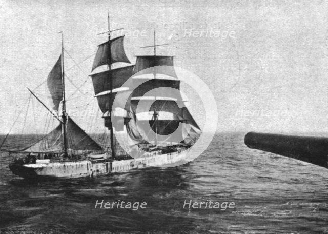 At sea; A sailboat is boarding: during the whole visit, the ship remains under the cannon..., 1917. Creator: Unknown.