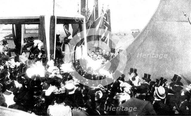 The Duchess of York christening the "Albion", 1898. Creator: Russell & Sons.