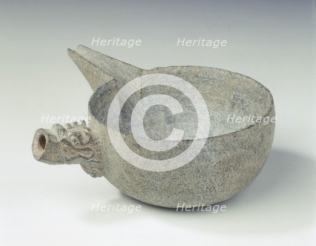 Steatite pouring bowl with dragon head handle, Tang dynasty, China, c618-c906. Artist: Unknown