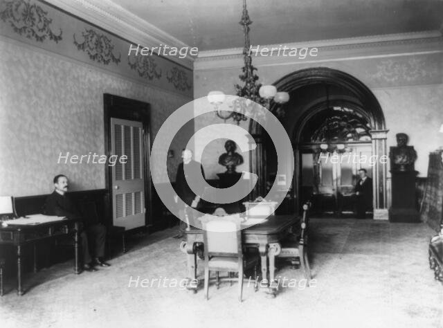 The office lobby in the White House, between 1889 and 1906. Creator: Frances Benjamin Johnston.