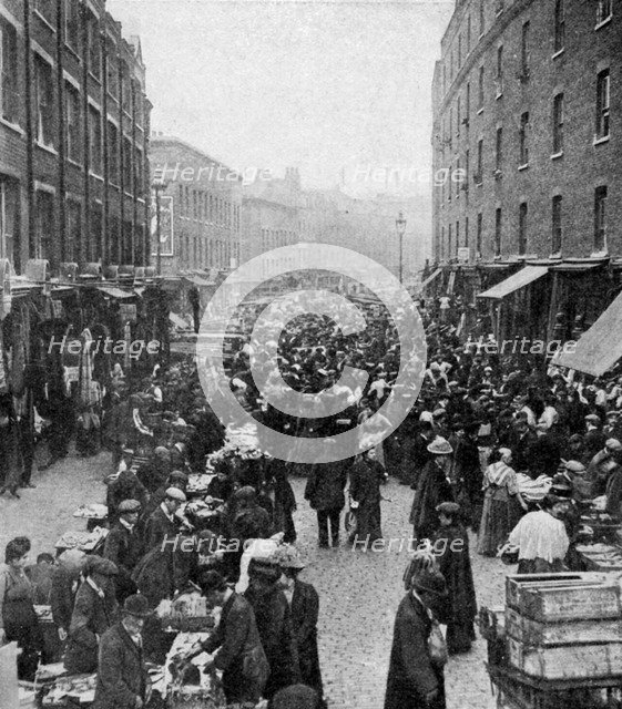 Sunday market, Wentworth Street, East London, c1930s. Artist: Unknown