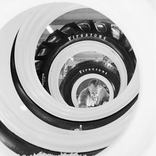 Row of Firestone tyres at the Royal Smithfield Show at Earls Court, London, 1956. Creator: John Gay.