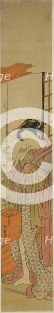 Courtesan Admiring Morning Glories while Cleaning Her Teeth, c. 1775. Creator: Isoda Koryusai.