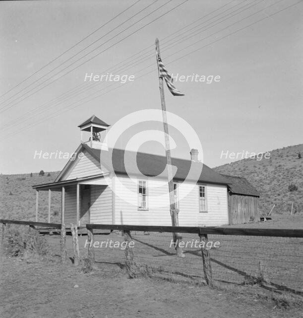Eastern Oregon county school in clearing in the sage bush, Baker County, Oregon, 1939. Creator: Dorothea Lange.