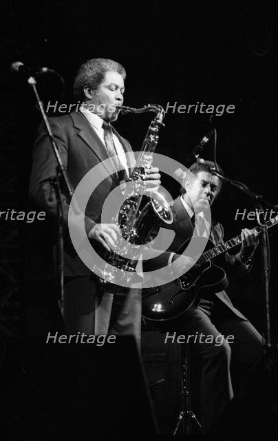 Frank Foster and Kenny Burrell, Dominion Theatre, London, Nov 1985. Creator: Brian O'Connor.