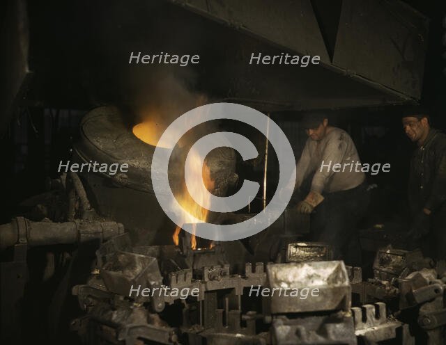 Casting a billet from an electric furnace, Chase Brass and Copper Co., Euclid, Ohio, 1942. Creator: Alfred T Palmer.