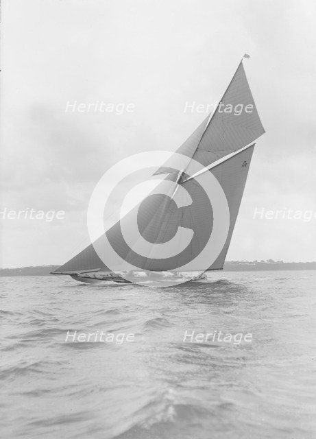 The gaff rigged 15 Metre yacht 'Paula III' sailing close-hauled, 1915. Creator: Kirk & Sons of Cowes.
