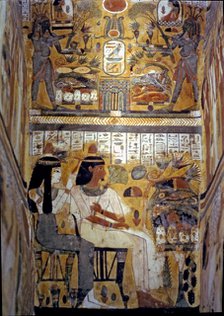 Frescoes inside a sarcophagus in wood.