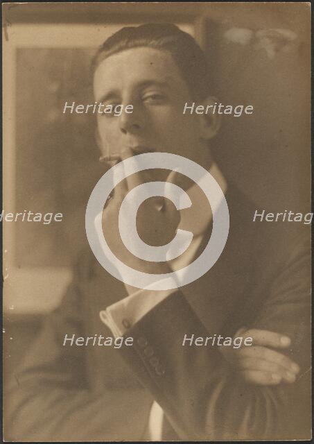Portrait of a Man Smoking Cigarette, 1907-1943. Creator: Louis Fleckenstein.
