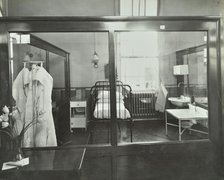 An isolation chamber, Brook General Hospital, London, 1935. Artist: Unknown.