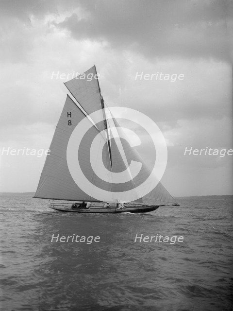 The 8 Metre 'Spero' (H8) sailing upwind, 1912. Creator: Kirk & Sons of Cowes.