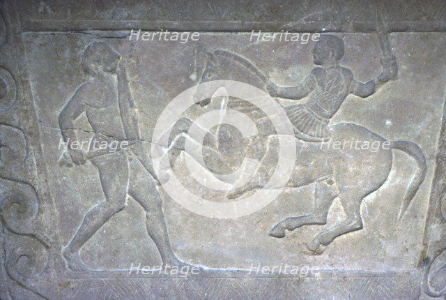 Etruscan Stela Detail, Combat between horseman and foot-soldier, c4th century BC. Artist: Unknown.