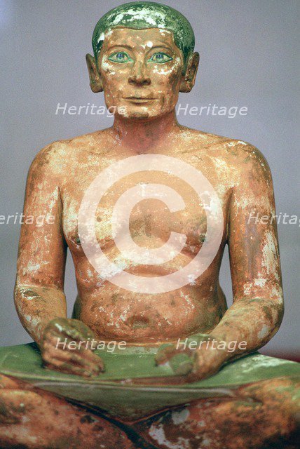 Egyptian seated scribe model. Artist: Unknown