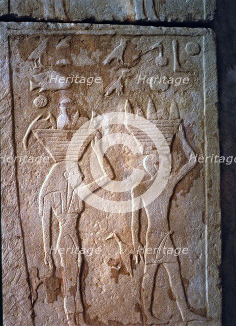 Detail of the reliefs of the back door in the tomb of Princess Tjentet, from Gizeh.