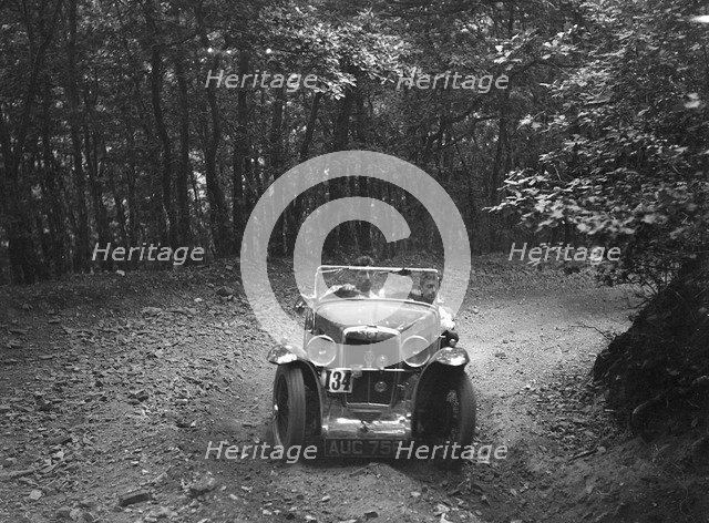 MG J2 competing in the B&HMC Brighton-Beer Trial, Fingle Bridge Hill, Devon, 1934. Artist: Bill Brunell.