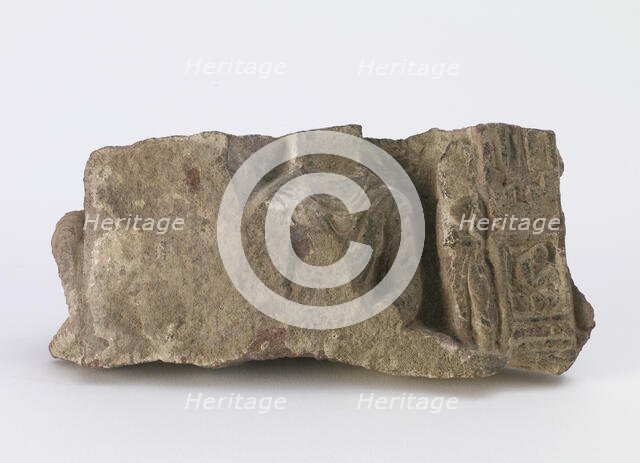 Fragment, showing torso of seated Buddha..., Period of Division, ca. 500. Creator: Unknown.