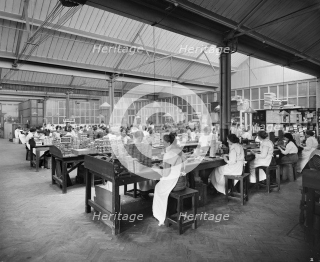 Cigarette production at the Teofani tobacco factory, Chryssel Road, Brixton, London, September 1916. Artist: H Bedford Lemere.