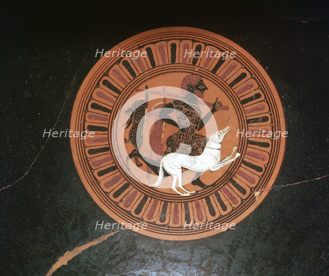 Detail of a Greek kylix showing a hunter and his dog. Artist: Unknown