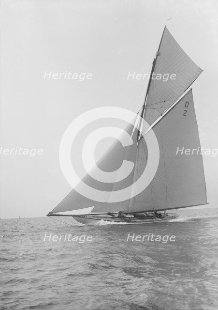 The 15-metre cutter 'Ostara' sailing close-hauled, 1912. Creator: Kirk & Sons of Cowes.