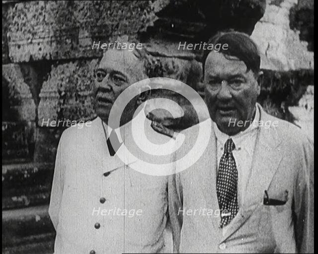 Publisher Alfred Harmsworth, 1st Viscount Northcliffe, Talking to Another Man by a Ruin, 1922. Creator: British Pathe Ltd.
