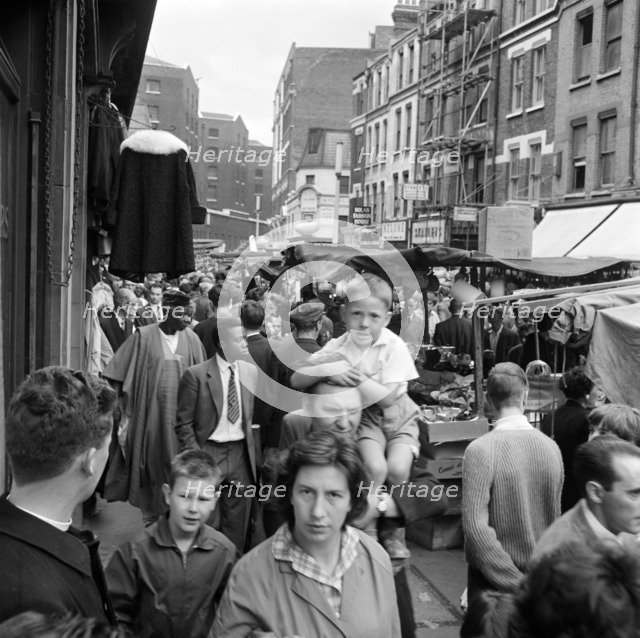 Middlesex Street, part of Petticoat Lane Market, Whitechapel, London, c1946-c1959. Creator: John Gay.