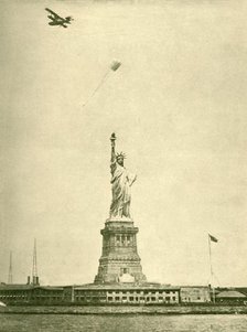 'The Statue of Liberty, with Uplifted Torchlight, New York Harbour', c1930. Creator: Unknown.