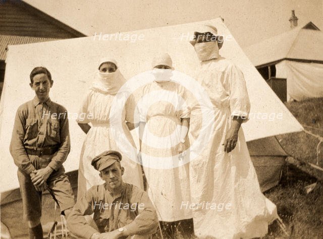 Ethel Newland and fellow nurses and military, c1918. Creator: Unknown.