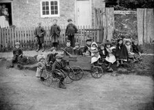 Children with go-carts at Greatworth, Northamptonshire, 1901. Artist: Alfred Newton & Sons