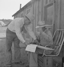 Oklahoma farmer, now living in Cow Hollow, is a FSA borrower, Malheur County, Oregon, 1939 Creator: Dorothea Lange.
