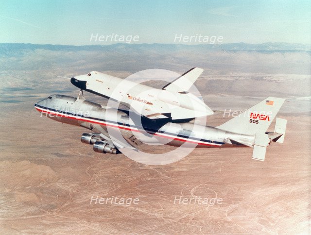 Space Shuttle Orbiter mounted on top of a Boeing 747 carrier aircraft, 1977. Artist: Unknown