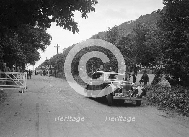 SS Stanley's Jaguar SS competing at the MCC Torquay Rally, July 1937. Artist: Bill Brunell.