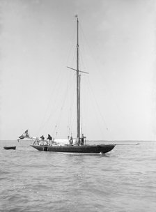 The sailing yacht 'Rollo' at anchor, 1911. Creator: Kirk & Sons of Cowes.
