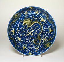 Dish with Dragons amid Clouds, Chasing Flaming Pearls, Qing dynasty, Kangxi reign mark (1662-1722). Creator: Unknown.