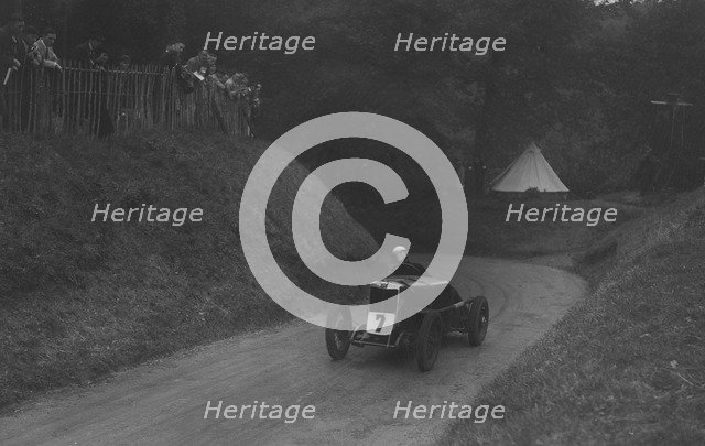 MG C type of Barbara Skinner competing in the Shelsley Walsh Hillclimb, Worcestershire, 1935. Artist: Bill Brunell.