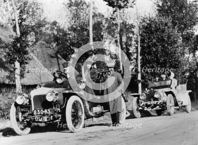 A comparative trial between a Daimler and Rolls Royce Silver Ghost, c1909. Artist: Unknown