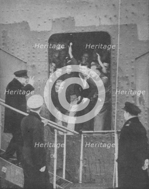 'Mr. Churchill gives the V-Sign to cheering members of the ship's crew', 1943-1944. Artist: Unknown.