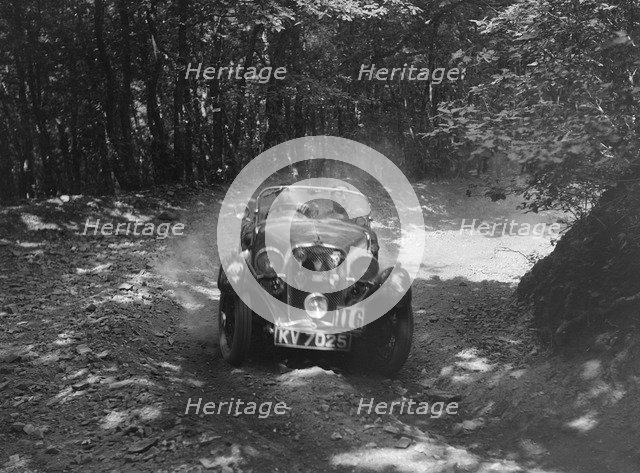 Singer Le Mans competing in the Brighton & Hove Motor Club Brighton-Beer Trial, 1934. Artist: Bill Brunell.