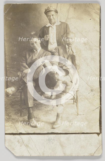 Photographic postcard of three unidentified men, 1904-1918. Creator: Unknown.