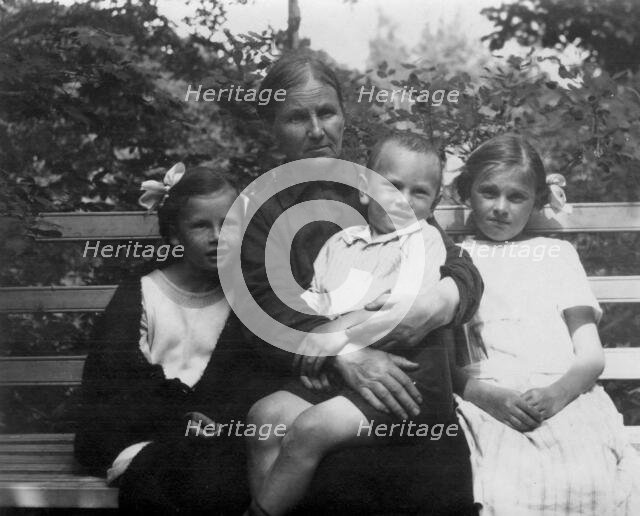 Briner Julius with his grandmother Anna Timofeevna Blagovidova, sisters Vera and Irina, 1924. Creator: Unknown.