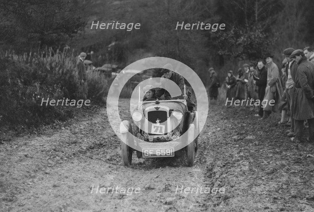 Austin 7 Boyd Carpenter 2-seater sports of E Stockvis taking part in the Inter-Varsity Trial, 1930. Artist: Bill Brunell.