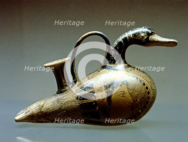 Ceramic baby bottle decorated as a duck, made in terracotta.