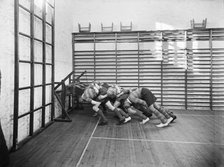 Students practicing rugby scrummaging, Launceston College, Cornwall, 1930s. Artist: Marshall Keene and Company.